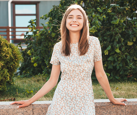 Smiling Brainway user after overcoming procrastination with her personalized anti-procrastination plan